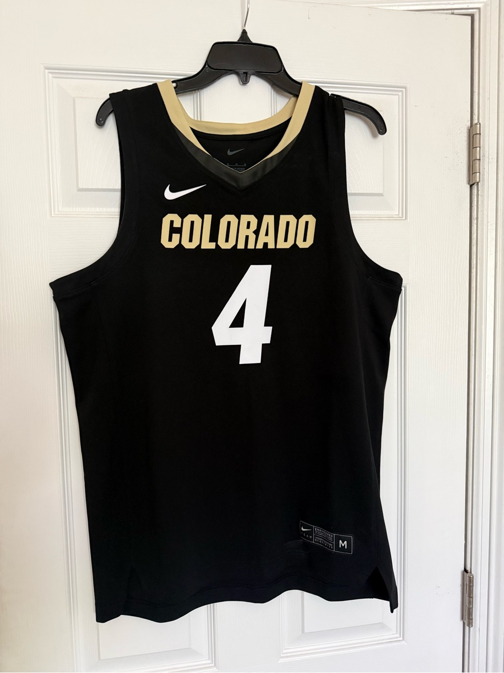CU Boulder basketball jersey, size medium.